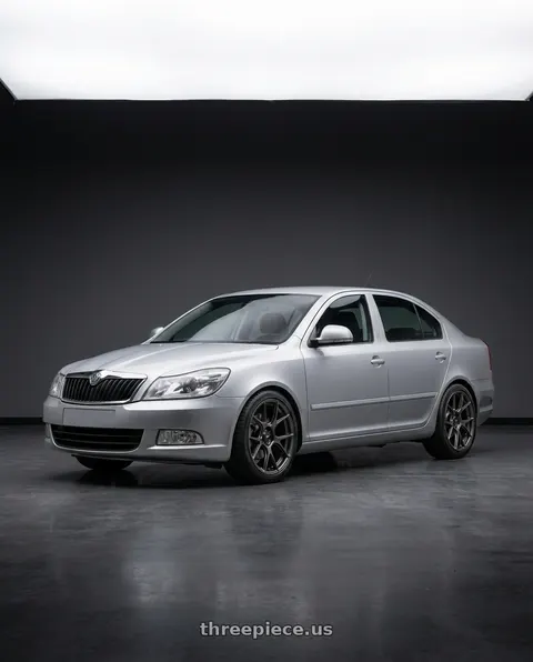 2012 Skoda Octavia with Konig Ampliform 5x112 18x8.5+43 Dark Metallic Graphite wheels