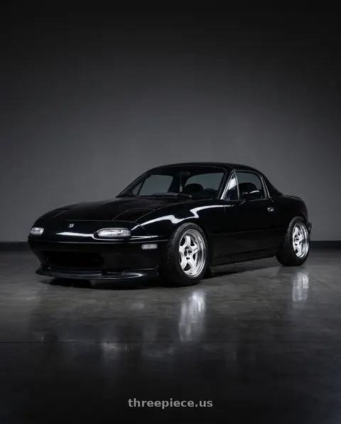 1995 Mazda Miata with Work Meister S1 2P 4x100 15x9+12 A Disk Black wheels