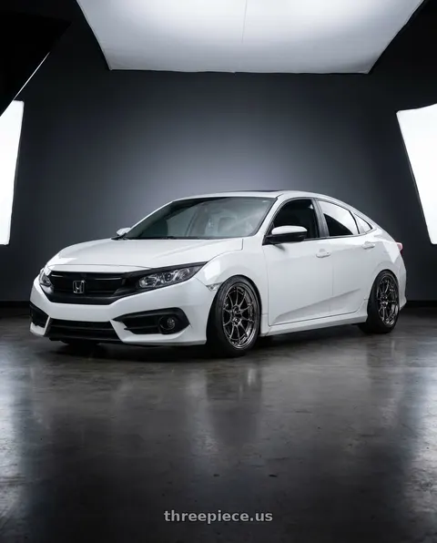 2016 Honda Civic with Enkei NT03+M 5x114.3 18x9.5+27 SBC wheels
