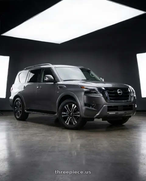 2023 Nissan Armada with O.E. Revolution G-10 6x139.7 22x9 +24 Gloss Black & Machined wheels