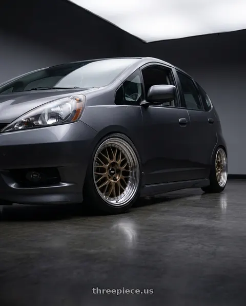 2012 Honda Fit Sport with Work Meister M1 3p 4x100 16x7+38 W Disk Titanium Gold wheels