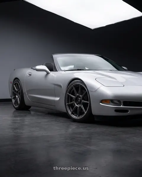 2000 Chevrolet Corvette with Konig Ampliform 5x114.3 19x9.5+25 Dark Metallic Graphite wheels