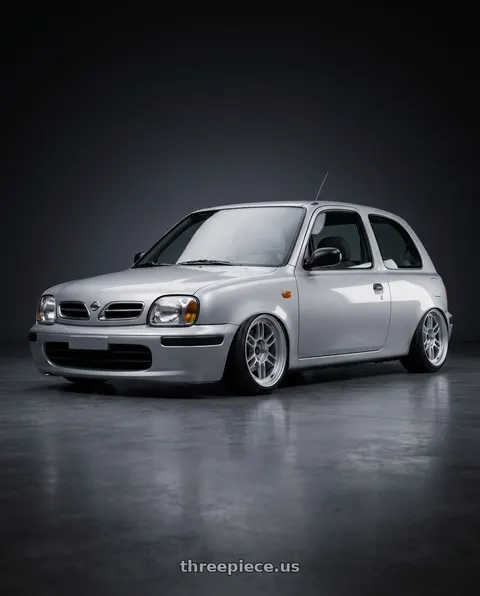 1998 Nissan march with Enkei RPF1RS 5x114.3 18x10+6 Silver wheels