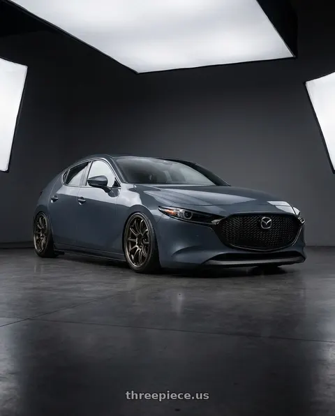 2023 Mazda 3 with Advan Racing RS-DF Progressive 5x114.3 18x8+44 Dark Bronze Metallic wheels