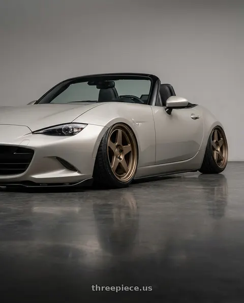 2021 Mazda MX-5 Miata with Kansei K12B KNP 5x114.3 17x9 35 Bronze wheels