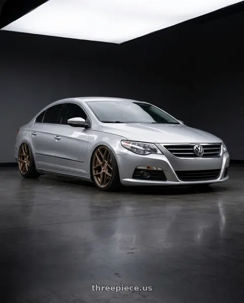 2015 Volkswagen CC with Aodhan AFF2 5x112 19x8.5+35 Matte Bronze wheels