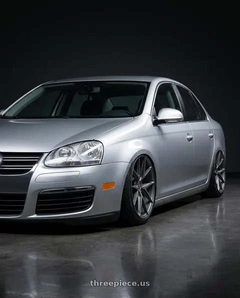 2009 Volkswagen Jetta with Niche 1PC M116 MISANO 5X112 18X8 +42 MATTE GUN METAL wheels