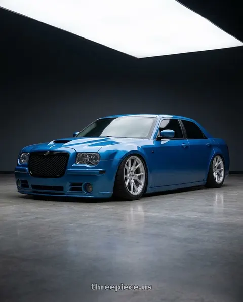 2007 Chrysler 300 with Voxx Replica 50ANN 5x115 20x10.5+25 Matte Silver wheels