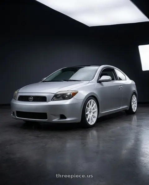 2007 Scion tC with RTX Stag 5x100 17x8 +35 Satin White wheels