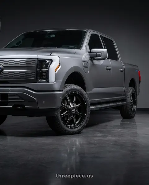 2022 Ford F-150 Lightning with Moto Metal MO970 6X135/6X139.7 20X9 +12 SEMI GLOSS BLACK MILLED wheels