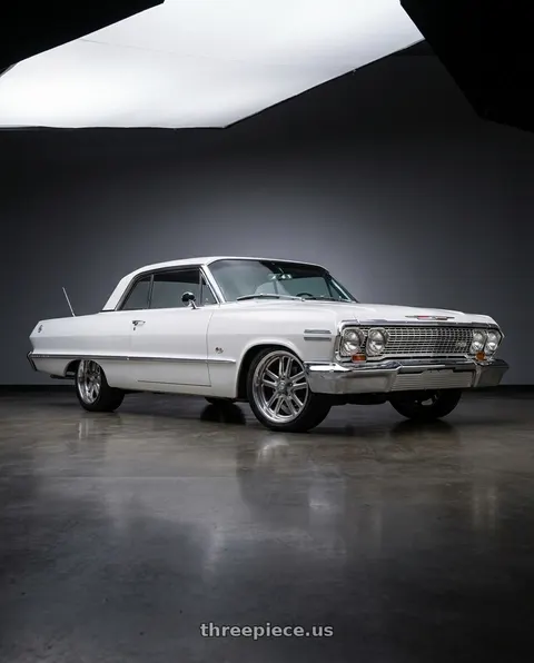 1963 Chevrolet Impala with US Mag 1PC U130 BULLET 5X120.65 20X8 +1 TEXTURED GUN METAL WITH MILLED EDGES wheels