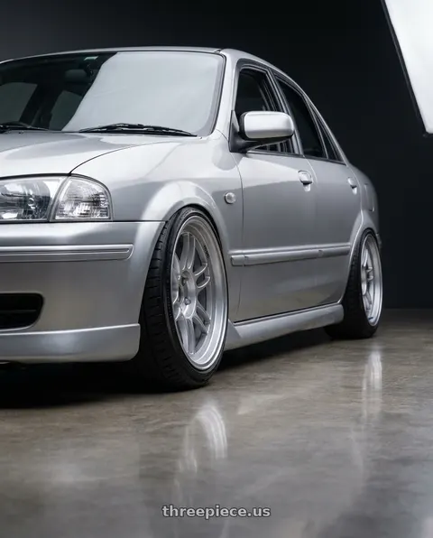 2001 Ford tierra with Enkei RPF1RS 5x114.3 18x9.5+12 Silver wheels