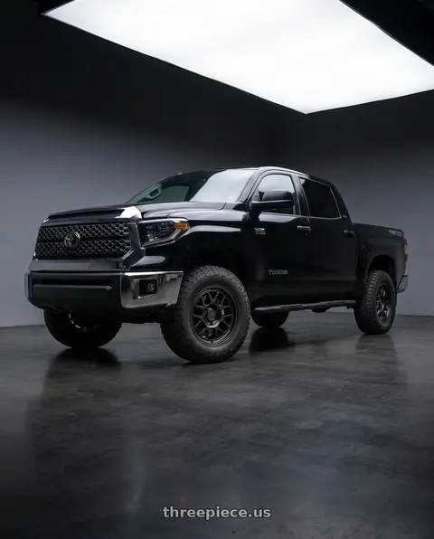 2020 Toyota Tundra with KMC KM717 BULLY OL 5X150 17X8.5 +18 SATIN BLACK wheels