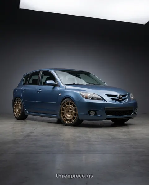 2008 Mazda 3 with fifteen52 METRIX MX 5x114.3 17x8 +38 BRONZE (MATTE BRONZE) wheels