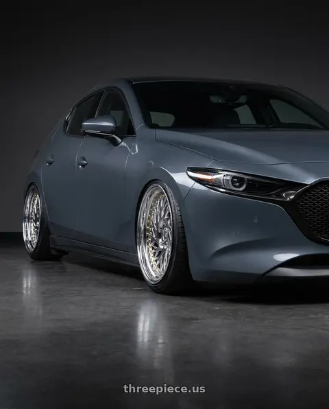 2023 Mazda 3 with Aodhan DS03 5x114.3 18x9.5 +30 Vacuum Chrome w/Gold Rivets wheels