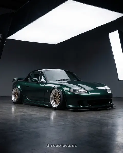 2000 Mazda Miata with Work Meister M1 3p 4x100 16x10+5 O Disk Titanium Gold wheels