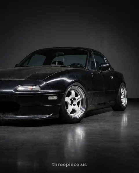 1995 Mazda Miata with Work Meister S1 2P 4x100 15x8.5+12 O Disk Black wheels