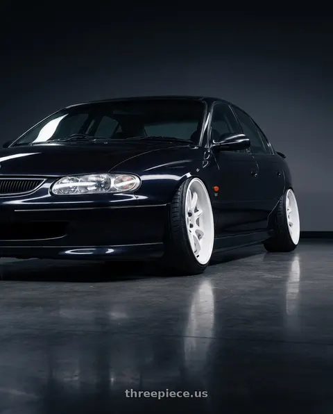 1997 holden vt commodore raven with Work Emotion D9r 5x120 19x10.5 +23 White wheels