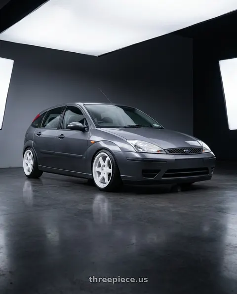2004 Ford Focus with 9six9 SIX-1 5x100 17X8 +35 Competition White wheels