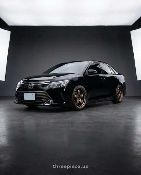 2015 Toyota Camry with Work Meister S1R 4x100 16x9+0 A Disk Ashdot Titanium wheels