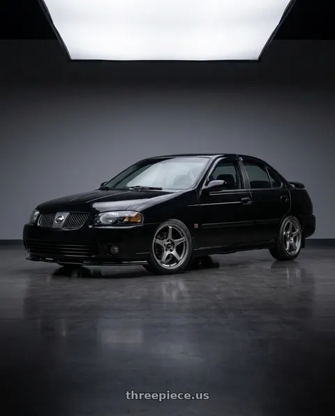 2002 Nissan Sentra with Enkei TS-5 5x114.3 17x8+40 Storm Grey wheels