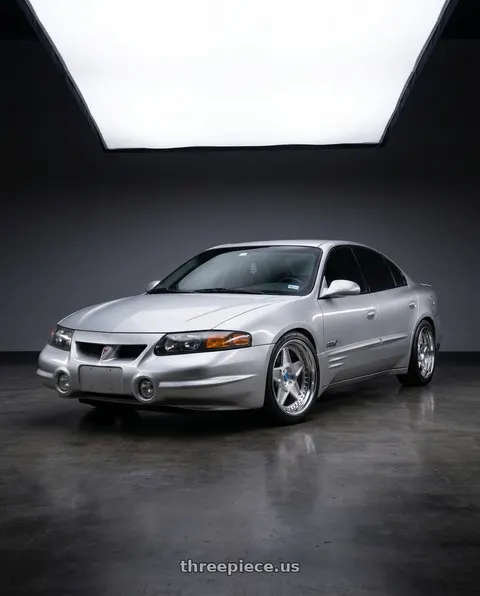 2000 Pontiac Bonneville SSEi with Modern Concepts MC-13 5x114.3 18x8.5 +30 Brushed Face Chrome Lips wheels