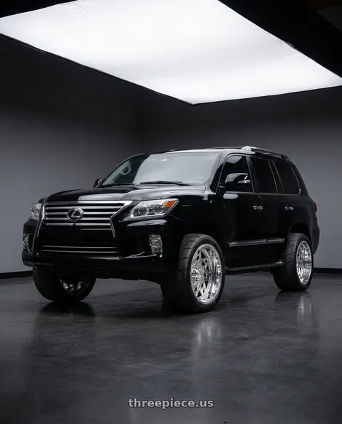 2015 Lexus LX570 with American Truxx Forged Aries ATF1909 8x170 22x12-44 Polished wheels