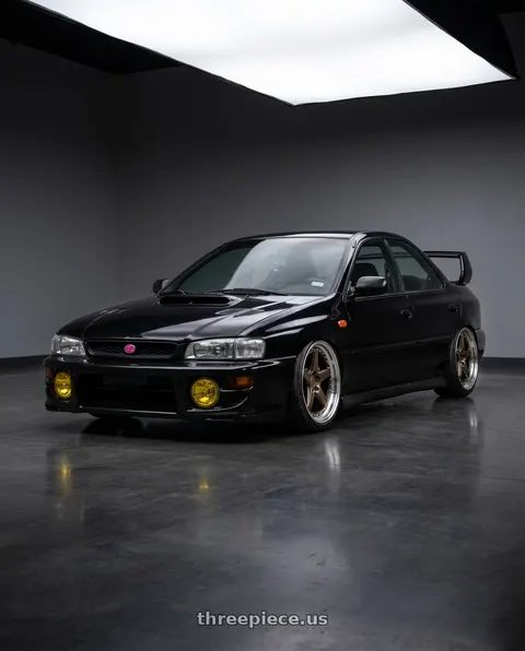 1998 Subaru Impreza with Aodhan DS05 5x100 18x8.5+35 Bronze w/Machined Lip wheels