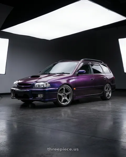 1997 Toyota Caldina with Enkei TS-5 5x100 18x9.5+45 Storm Grey wheels