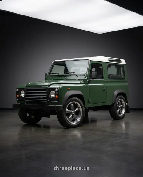 1998 Land Rover Defender with American Racing AR105 TORQ THRUST M 5X127 18X8 0 ANTHRACITE W/ MACHINED LIP wheels