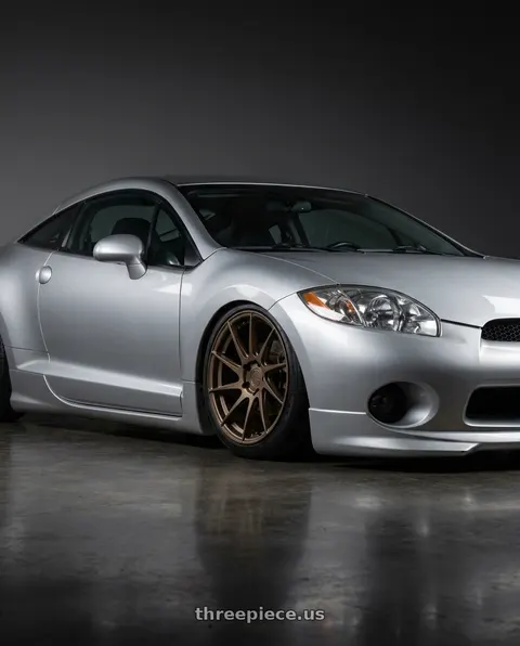 2010 Mitsubishi Eclipse with Aodhan AH09 5x114.3 18x9.5 +35 Matte Black wheels