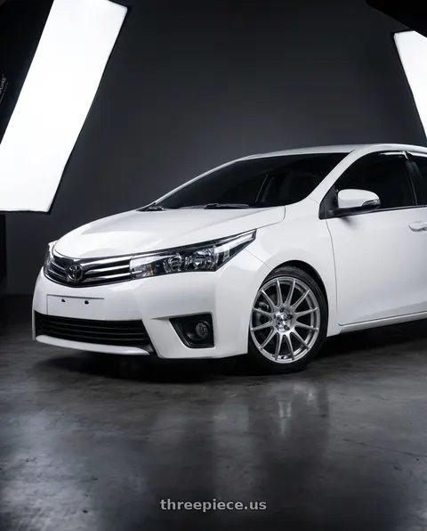 2014 Toyota Corolla with Maxxim 10S Winner 5X100/5x114.3 16x7 +40 Full Silver wheels