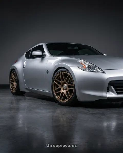 2009 Nissan 370Z with Forgestar F14 5x114.3 19x11 +15 Satin Bronze wheels