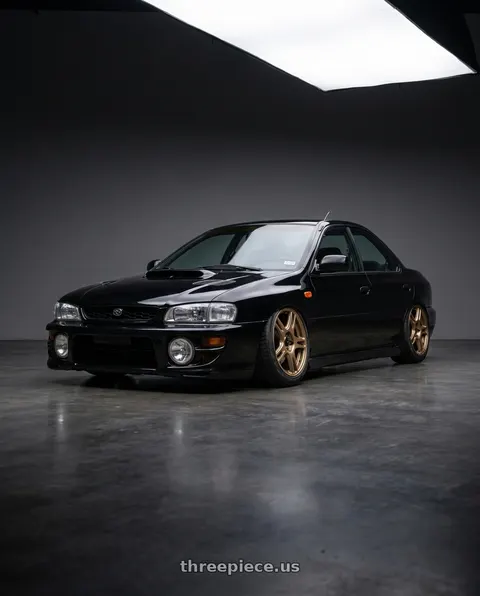 1998 Subaru Impreza with Konig Ampliform 5x100 18x8.5+44 Gloss Bronze wheels