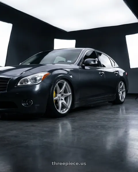 2011 INFINITI M56 with Kansei K11S Tandem 5x114.3 19x10.5 22 Hyper Silver wheels