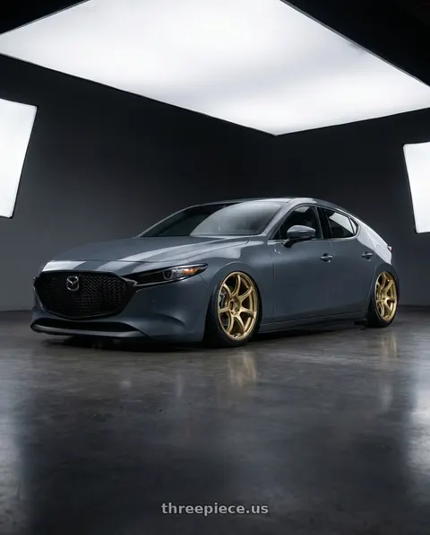 2023 Mazda 3 with Advan RGIII 5x114.3 18x8.0+45 Gold wheels