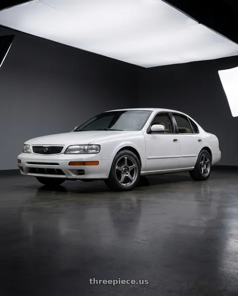 1997 Nissan Maxima GXE with Enkei TS-5 5x114.3 17x8+40 Storm Grey wheels