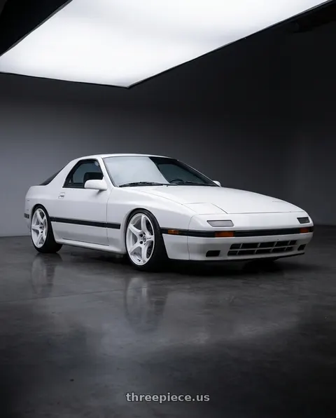 1988 Mazda RX-7 SE with Work Emotion T5r 5x114.3 17x9 +22 Ice White wheels