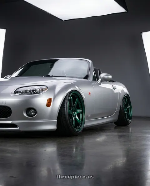 2007 Mazda MX-5 Miata with Volk Racing TE37 SONIC 4x100 16x8+35 Racing Green wheels