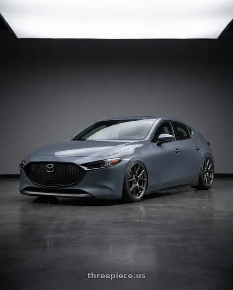 2023 Mazda 3 with Konig Ampliform 5x114.3 18x9.5+35 Dark Metallic Graphite wheels