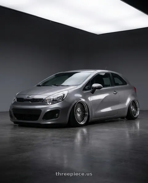 2013 Kia Rio 3 with Work Emitz Black Polish 5x108 19x12.5 +0 wheels