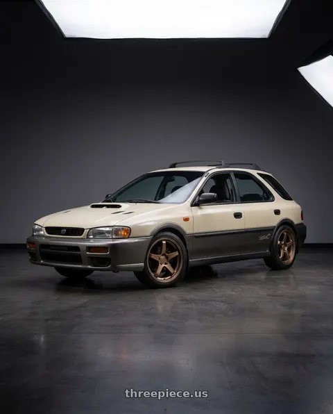 1997 Subaru Impreza Outback with KATANA RACING KR13 5x100 17x7.5 +40 Matte Bronze wheels