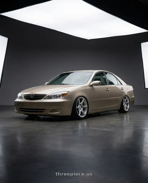 2003 Toyota Camry with Kansei K11S Tandem 5x114.3 17x9 22 Hyper Silver wheels