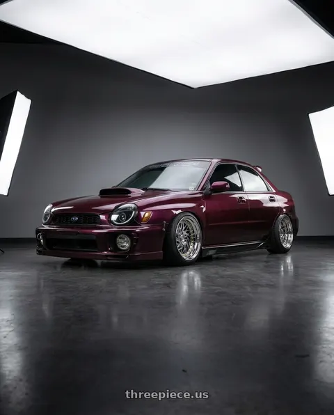 2002 Subaru Impreza WRX with Aodhan DS03 5x100 18x9.5 +35 Vacuum Chrome w/Gold Rivets wheels