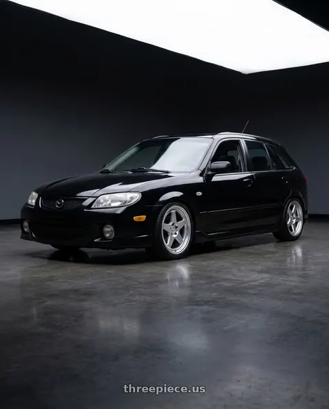 2002 Mazda Protege5 with Kansei K12H KNP 5X120 17x9 22 Hyper Silver wheels