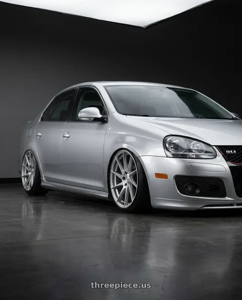 2009 Volkswagen Jetta with Aodhan AH09 5x112 18x9.5 +35 Gloss Silver Machined Face wheels