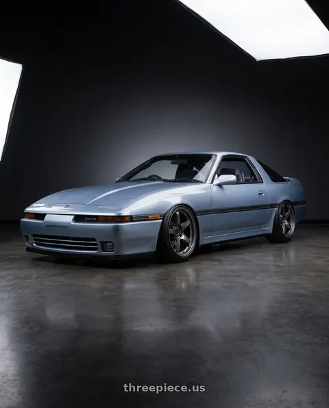 1987 Toyota Supra with Gram Lights 57CR 5x114.3 18x9.5+38 Glossy Grey wheels