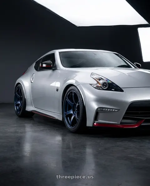 2018 Nissan 370Z with Volk Racing TE037 6061 5x120 18x10.5 +20 MAG BLUE wheels
