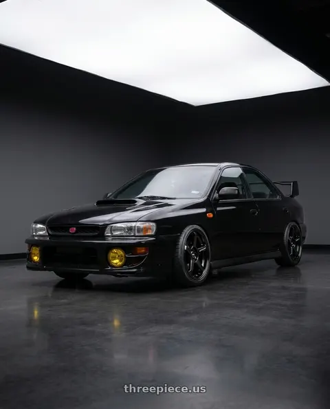 1998 Subaru Impreza with Motegi MR159 BATTLE V 5X100 17x8.5 +30 BLACKBIRD METALLIC wheels