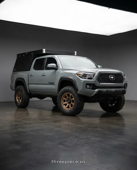 2023 Toyota Tacoma with KMC KM723 TRAIL 6X139.7 17X9 -12 MATTE BRONZE wheels